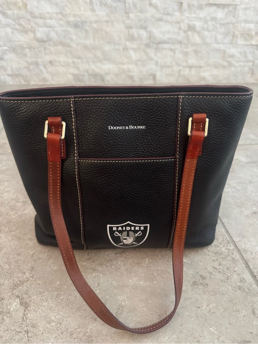 Dooney & Bourke Black Leather Raiders Logo Tote with Brown Straps